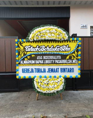 Papan Bunga Duka di Danime
